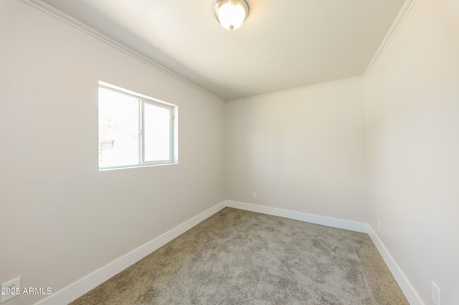 Building Photo - 4031 N 59th Dr