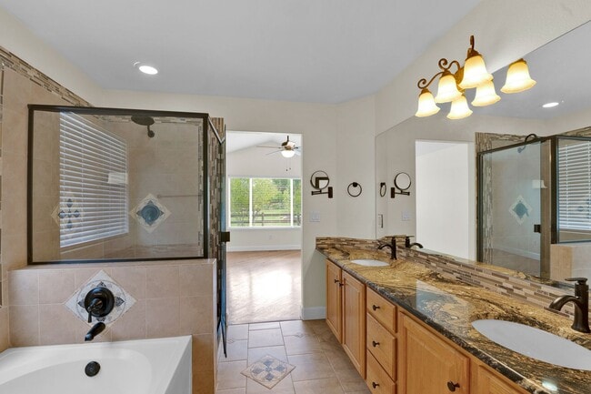 Building Photo - Beautiful home with 5 bedrooms, 3 1/2 bathrooms, 3-car garage available now!