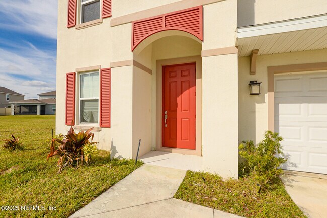 Building Photo - 10976 SW Tessili Wy