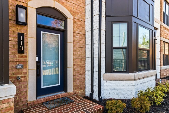 Building Photo - Your new home awaits you! Luxury Townhouse...
