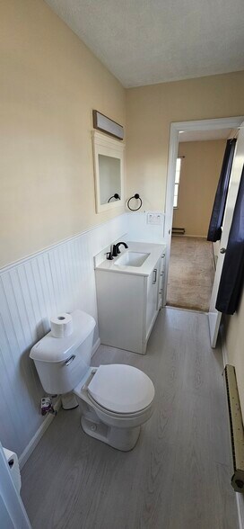 Half Bathroom with view of Back/Master Bedroom. Please note that rooms are larger than they appear d - 578 Tyler St