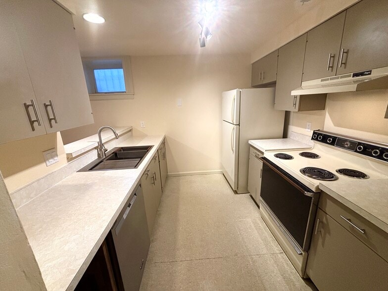 Kitchen with new sink, new faucet, new dishwasher - 2325 S 10th St