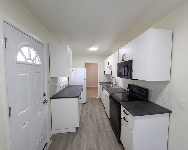 Building Photo - Charming 3BR House in University Hills