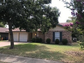 Building Photo - 10009 Woodstock Dr