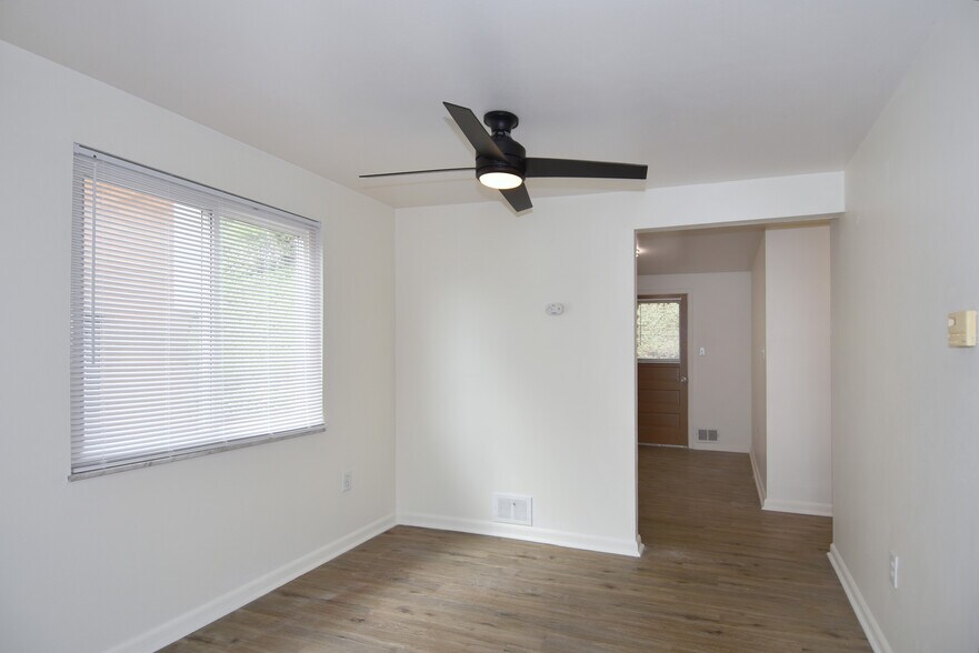 Separate dining room is freshly painted with all-new luxury vinyl plank flooring, new mini-blinds, a - 3156 Glendale Ave