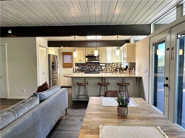 Building Photo - Fully furnished mid-century modern oasis located less than a mile