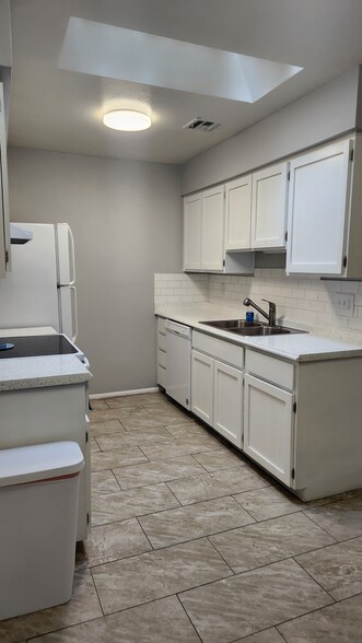 Kitchen: Garbage disposal & new dishwasher - 4820 N 89th Ave