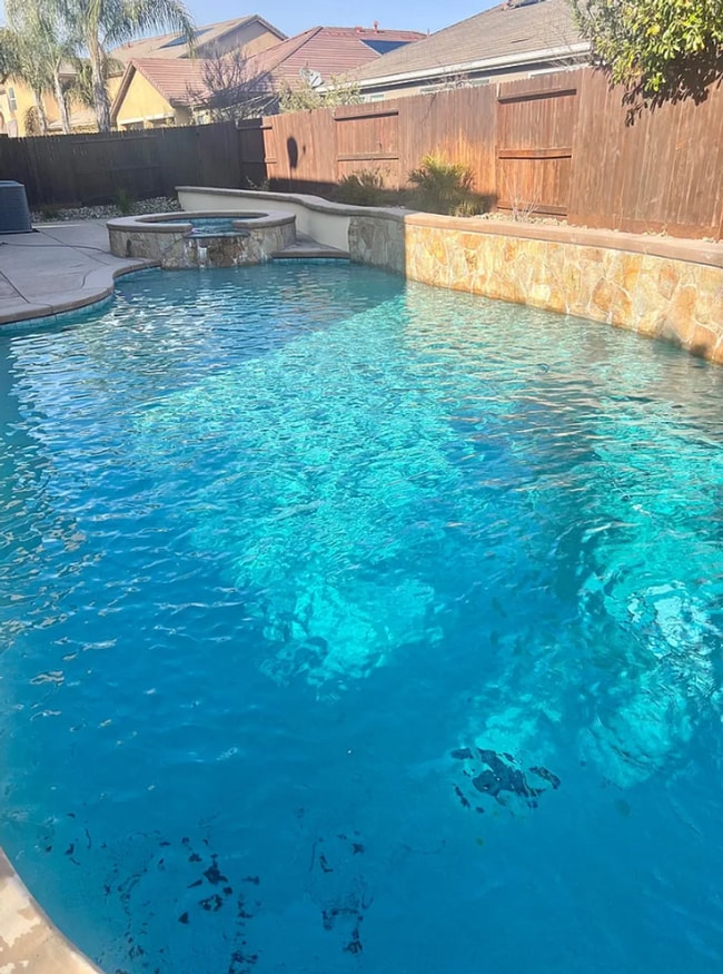 Building Photo - Elegant and Spacious Home with Pool & Park Views in Prime Roseville Location!