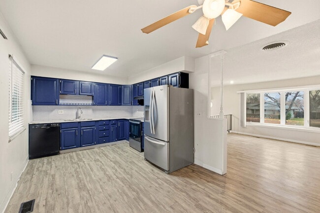 Building Photo - Split Level Home Features 4BD/2BA, Large Backyard and Deck. Newly Renovated Kitchen!  Convenient ...