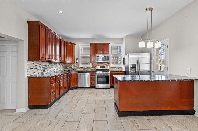 Building Photo - 6BR / 5BA Single-Family Home | 2,663 Sq Ft | Private Driveway | Deck | $4,200/mo Spacious 6-bedro...