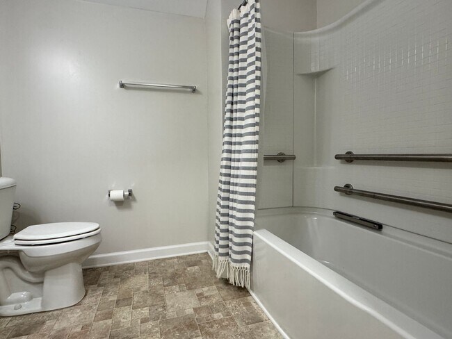 Building Photo - Beautiful, Conveninetly located First Floor Condo