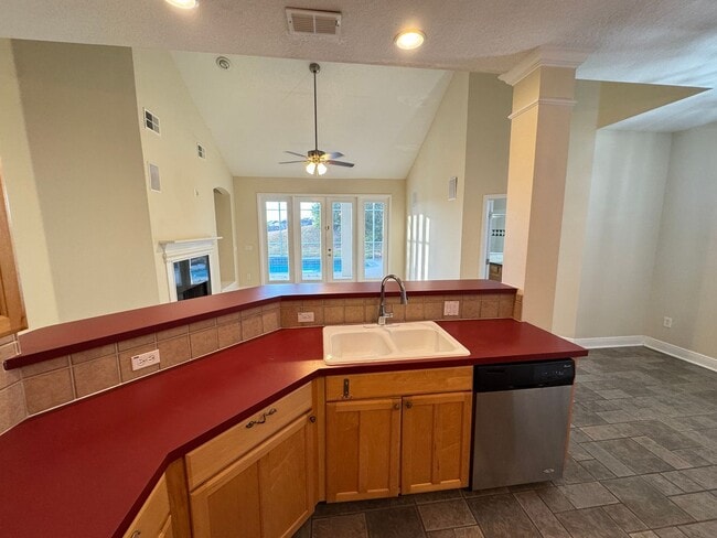 Building Photo - Spacious 4-Bedroom Home with Private Pool and Modern Comforts