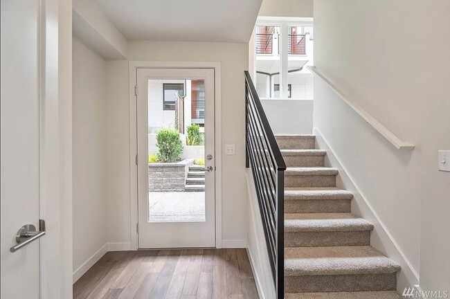 Foyer, stairs to second floor - 9268 50th Ave S