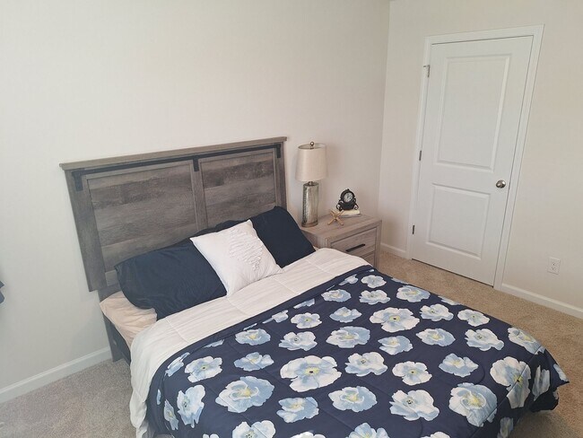 Building Photo - Lovely Four Bedroom Home  Appropriately 5 ...