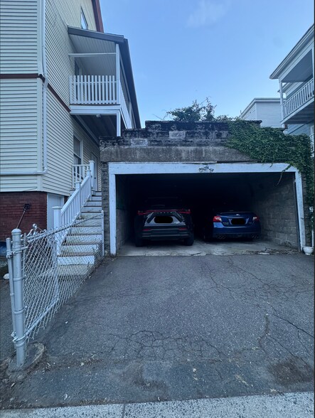 Covered garage spot on left - 44 Russell Rd