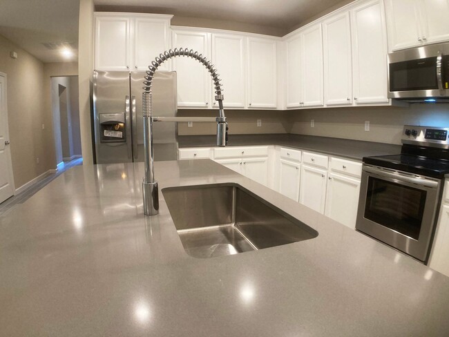 Building Photo - Your Private Escape with High-End Finishes...