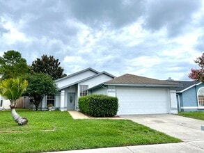 Building Photo - 3/2 ALAFAYA WOODS ADORABLE HOME in OVIEDO!