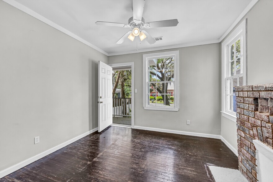 Two windows flood the area with gorgeous natural light. Walk out to balcony from here - 844 E 37th St