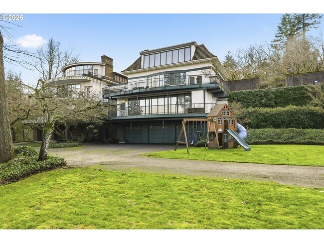 Building Photo - One-of-a-Kind 5BR Home with Floor-to-Ceiling Windows, Wraparound Decks & Breathtaking Treeline Views