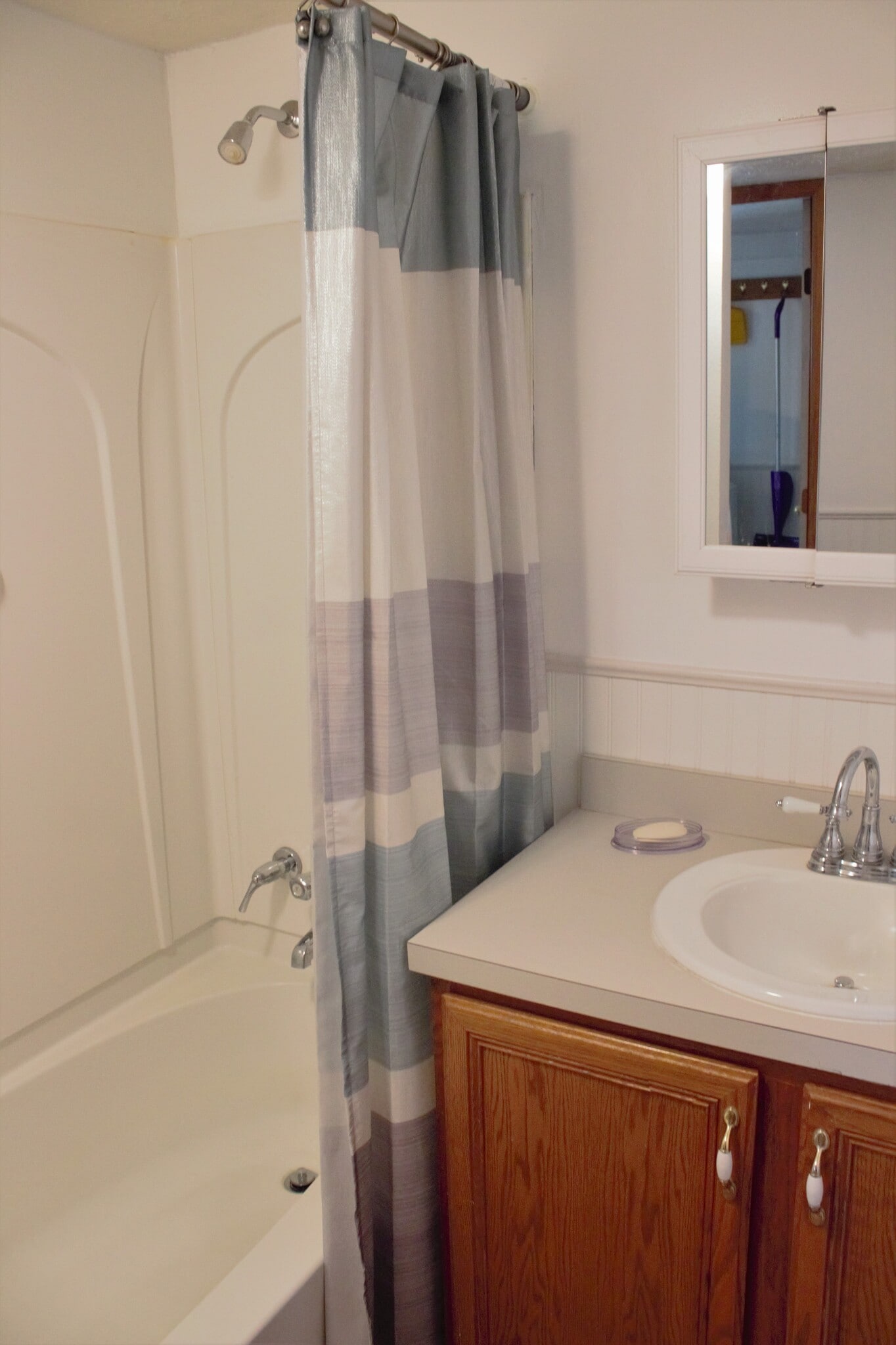 One bathroom - shower, tub, sink, toilet, mirrored medicine cabinet, newer exhaust fan, newer paint and flooring. - 9331C Tallmadge Road