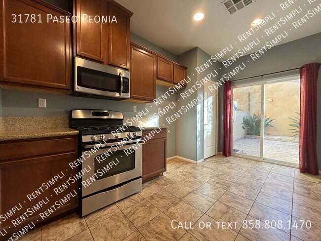 Building Photo - 2 BR 2.5 BA Condo located in The Paseos at...