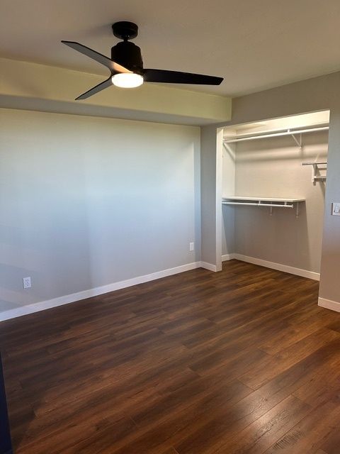 Bedroom area with closet and powerful ceiling fan. - 7079 Engineers Rd