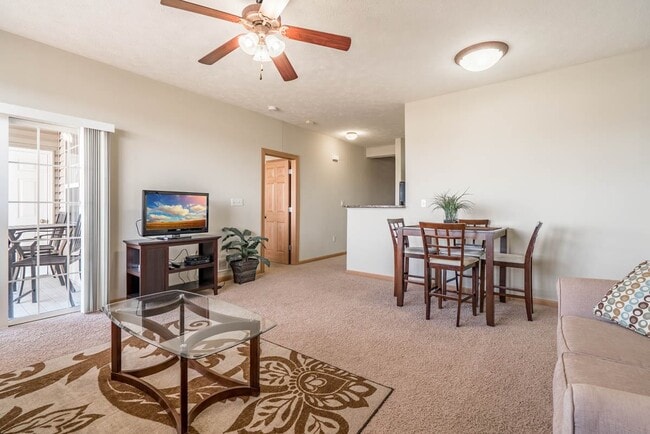 Each villa includes ceiling fans and a patio or balcony. - Stone Ridge Estates Apartments & Duplexes