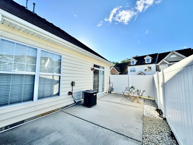 Building Photo - READY NOW!! End-Unit Loft-Style Condo w/1s...