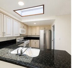 Building Photo - Welcome to this beautifully updated 4-bedroom, 2-bathroom home nestled on a private flag lot in t...