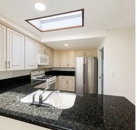 Building Photo - Welcome to this beautifully updated 4-bedroom, 2-bathroom home nestled on a private flag lot in t...