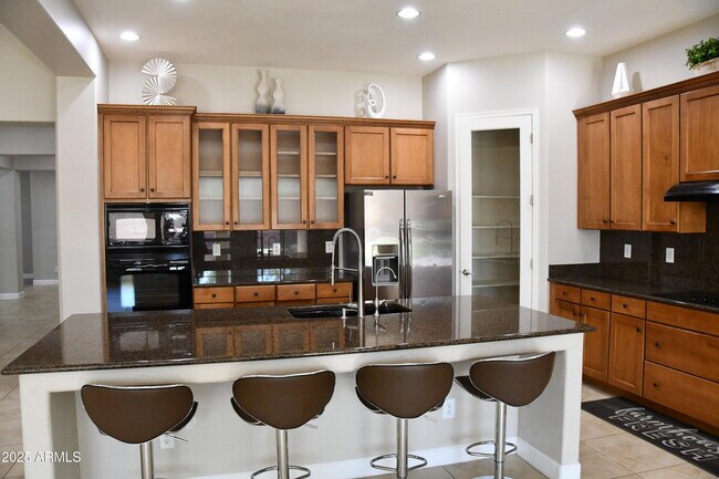 Building Photo - 9539 W Harmony Ln