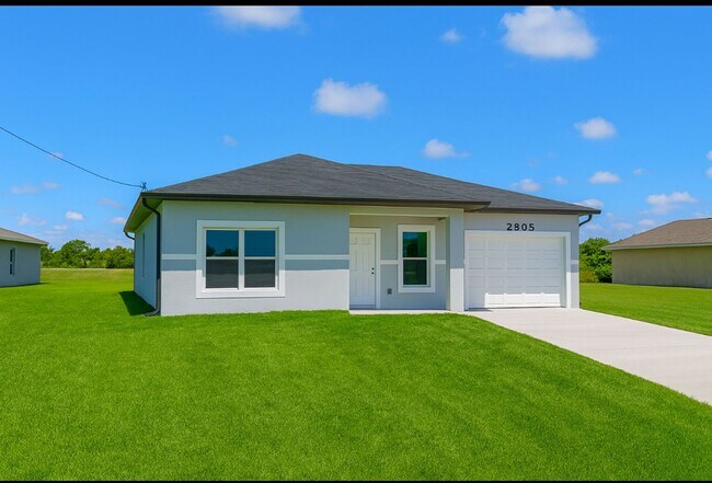 Building Photo - BRAND NEW 2/2/1- GREAT LOCATION-SW LEHIGH ACRES