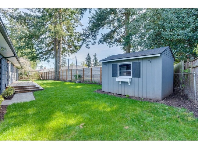 Building Photo - Stylishly Updated Mid-Century Gem on a Qui...