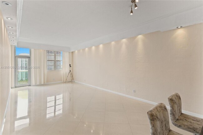 Building Photo - 19390 Collins Ave
