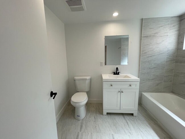 Building Photo - JUST COMPLETED MODERN TOWNHOMES! Never Lived In!