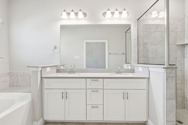 Building Photo - Discover Elevated Living at Normandy Village