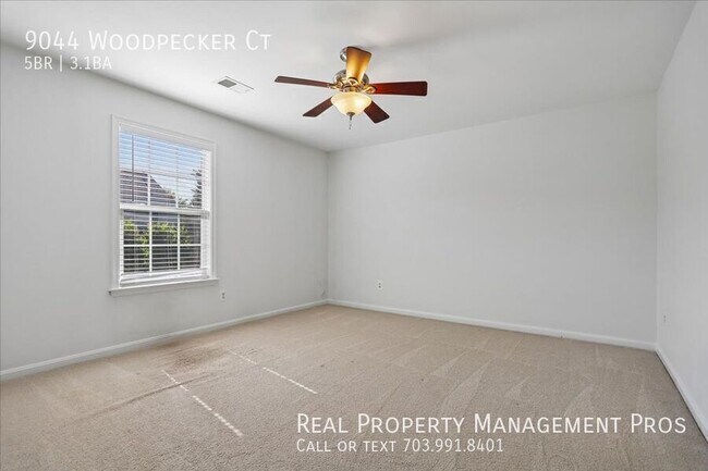 Building Photo - 9044 Woodpecker Ct