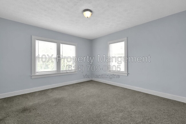 Building Photo - 1311 E 24th Ave