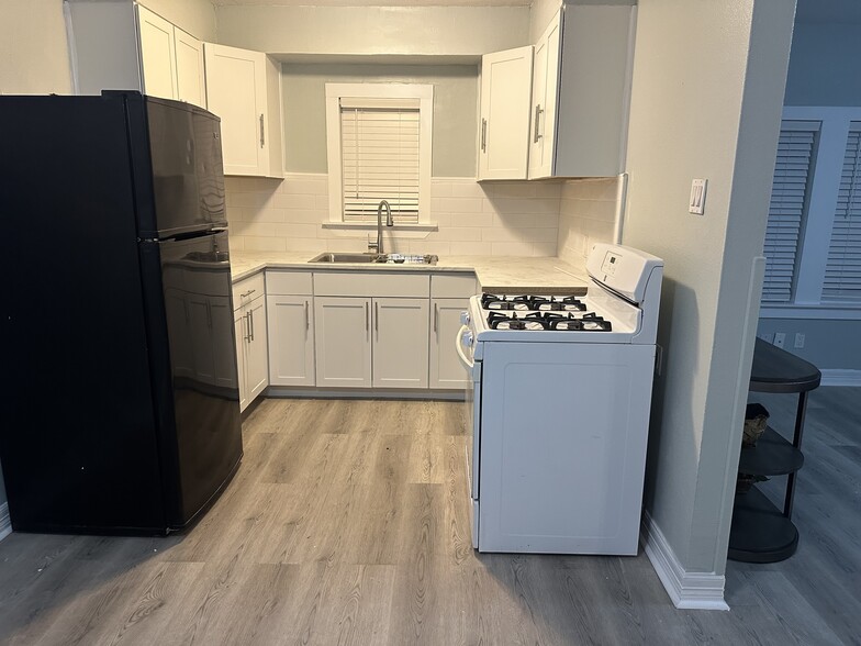 Full Kitchen with Stove / Oven / Full Size Refrigerator Provided - Recently Remodeled for use - 2312 53rd St