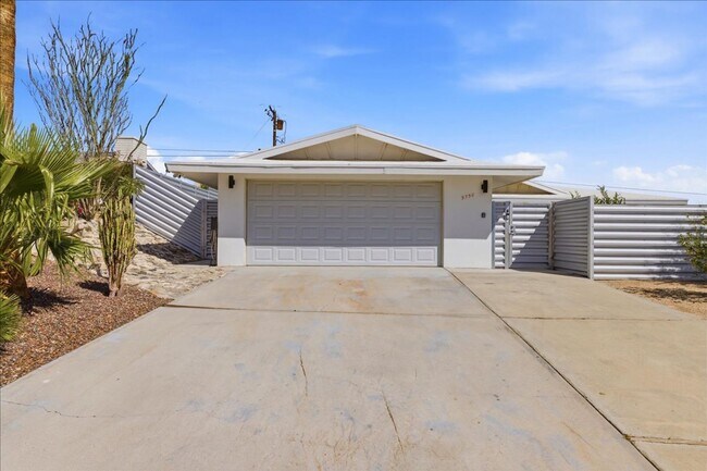 Building Photo - 3 bed / 2 Bath Mid-Century Home with Two-Car Garage, Soaking Pool and Manicured Backyard!