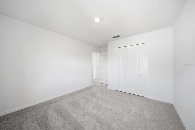 Building Photo - 8879 Coqui Song Ln