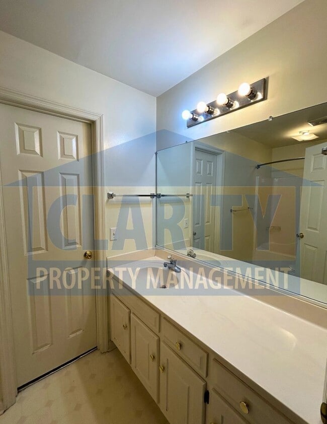 Building Photo - 3-bedroom condo w/ attached garage!