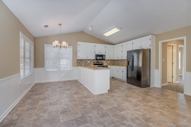 Building Photo - Cute Ranch Beauty in Covington, Fenced Back yard: Granite counter tops