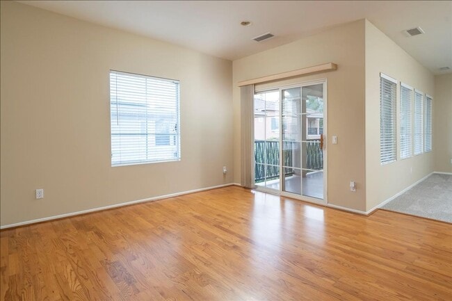 Building Photo - IMMACULATE 2+2 VALENCIA TOWNHOME!