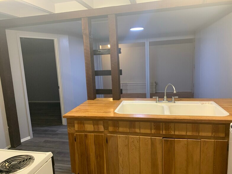 Kitchen with Counter / Bar - 1523 N Alleghaney Ave