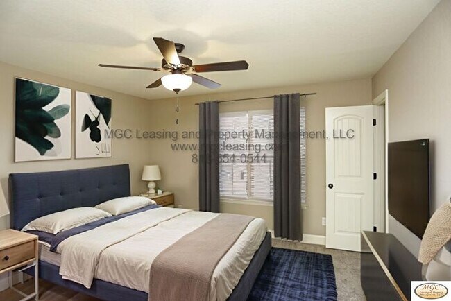 Building Photo - Modern Townhome with Designer Kitchen and High-End Touches in Raymore!