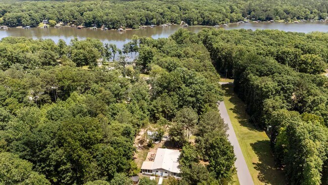 Building Photo - This FULLY FURNISHED ALL INCLUSVIE HOME IS...