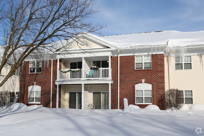 front of building behind snow - Legacy at Willow Pond