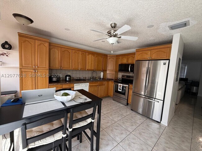 Building Photo - 7055 NW 173rd Dr