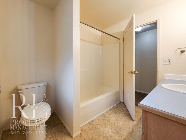 Building Photo - Modernized Two-Story with Open Layout, Gas Fireplace & Large Fenced Yard